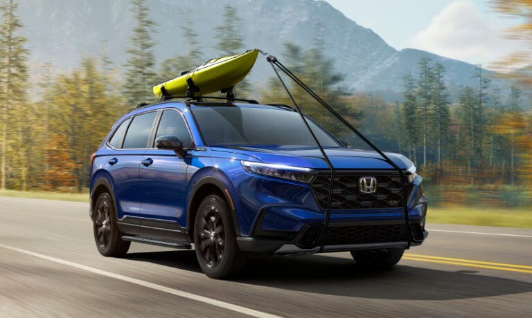 2026 Honda CR-V Exterior With Canoe On Mountain Road