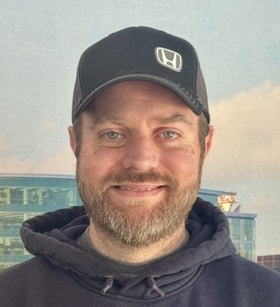 Staff member Tim Pahud from ID_9796219b49a2