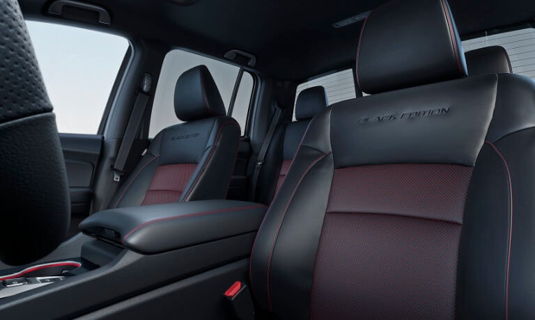 2026Honda-Ridgeline-InteriorFrontSeatsRedAndBlackLeather