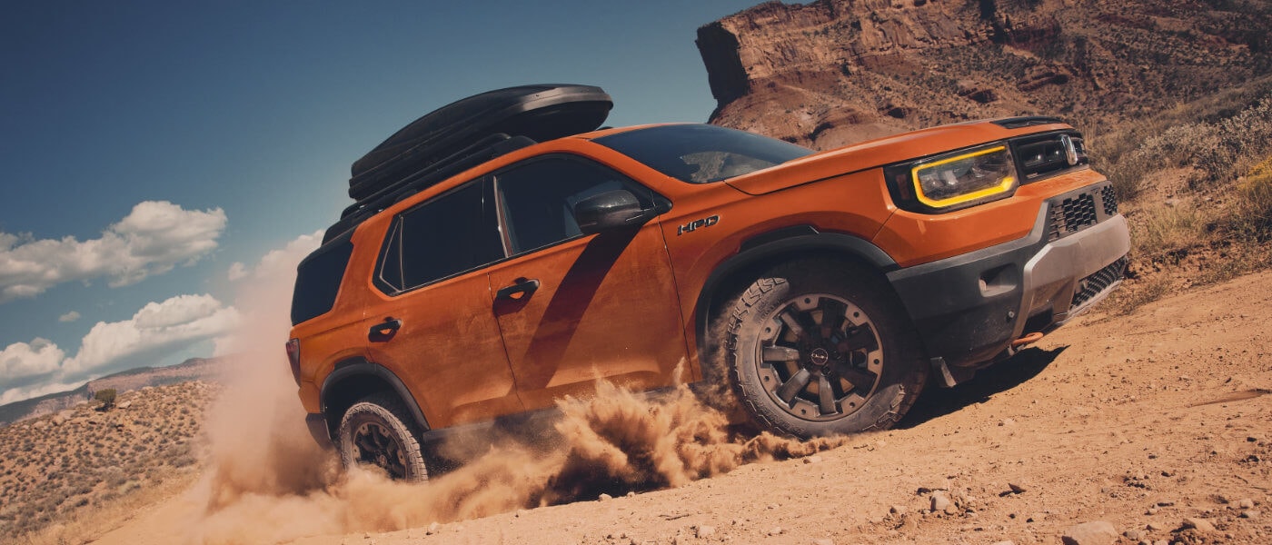 2026Honda-Passport-ExteriorOffroadingWithCartopCarrier