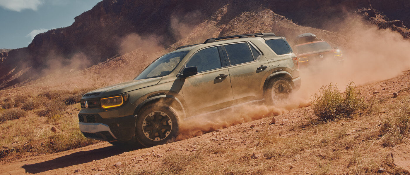 2026 Honda Passport Exterior Offroading Down Mountainside