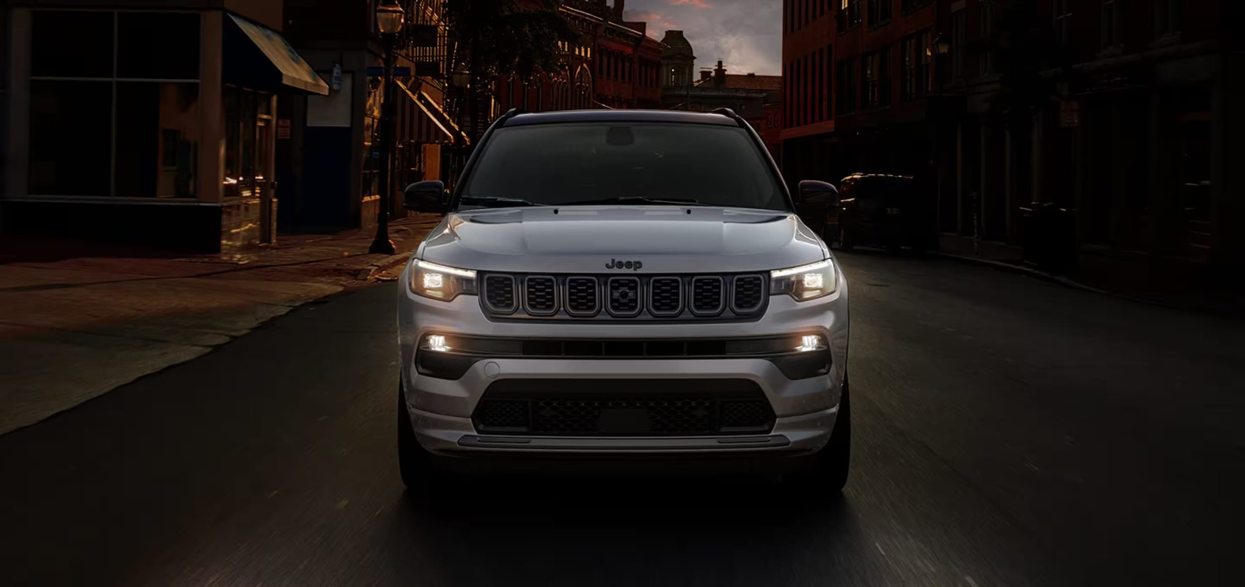 White CDJR Jeep Compass.jpeg