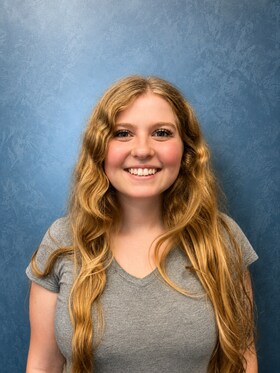 Staff member Lauren Carney from ID_68f5b2