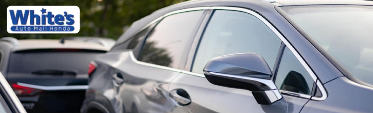 Certified%20Pre-Owned%20Cars%20Peace%20of%20Mind%20Guaranteed1.png Close-up of a CPO badge on a used Honda Civic, representing quality and warranty-backed confidence.