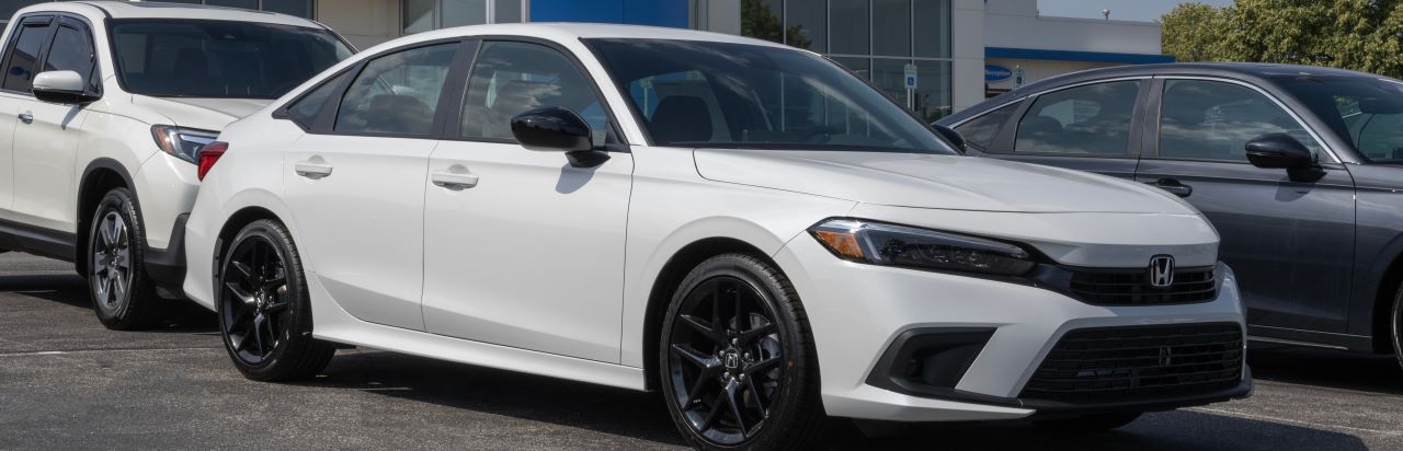 Find%20Quality%20Cars%20for%20Sale%20Near%20Clarksville%2C%20TN.jpg A wide selection of new and used Honda cars displayed in a dealership showroom near Clarksville, TN.