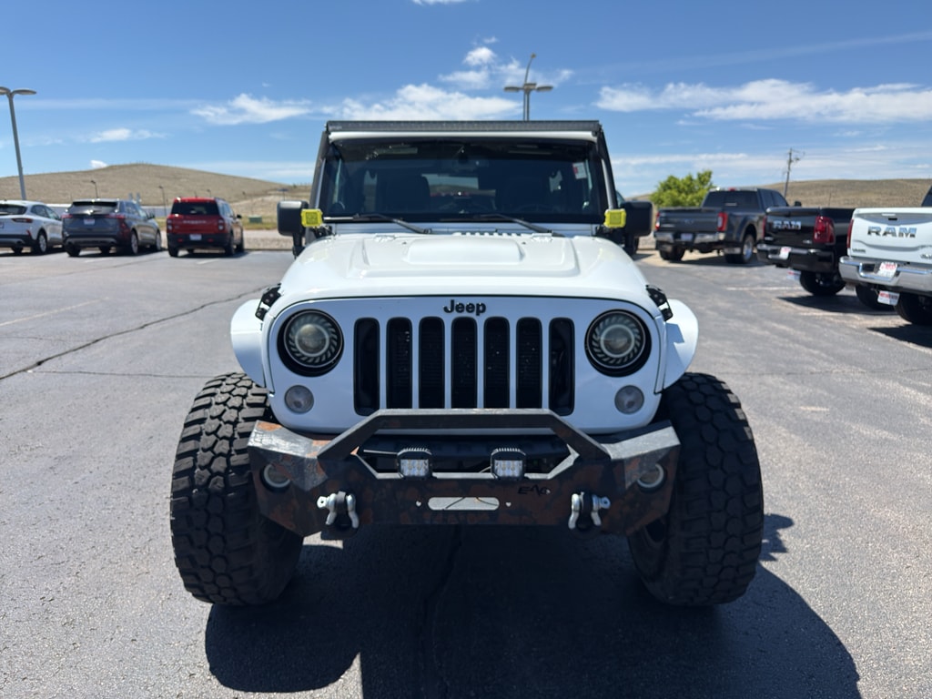 Used 2014 Jeep Wrangler Unlimited Sahara with VIN 1C4BJWEG4EL181320 for sale in Gillette, WY