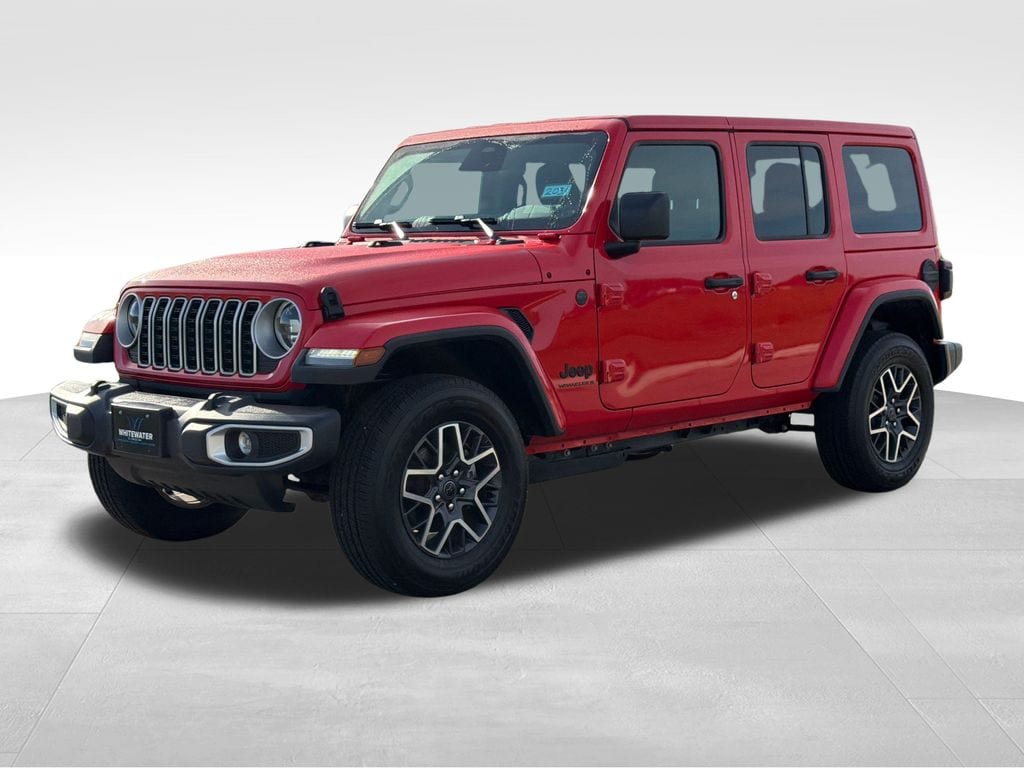 Used 2026 Jeep Wrangler 4-Door Sahara with VIN 1C4PJXENXTW253711 for sale in Saint Charles, Minnesota