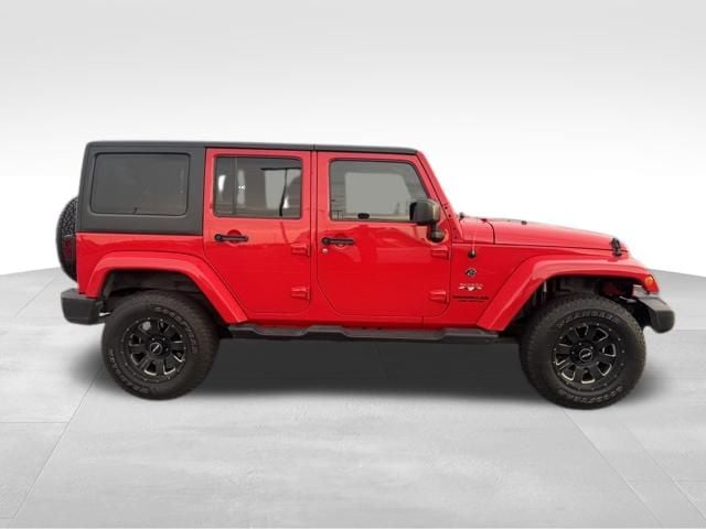 Used 2016 Jeep Wrangler Unlimited Sahara with VIN 1C4BJWEG4GL131892 for sale in Saint Charles, Minnesota