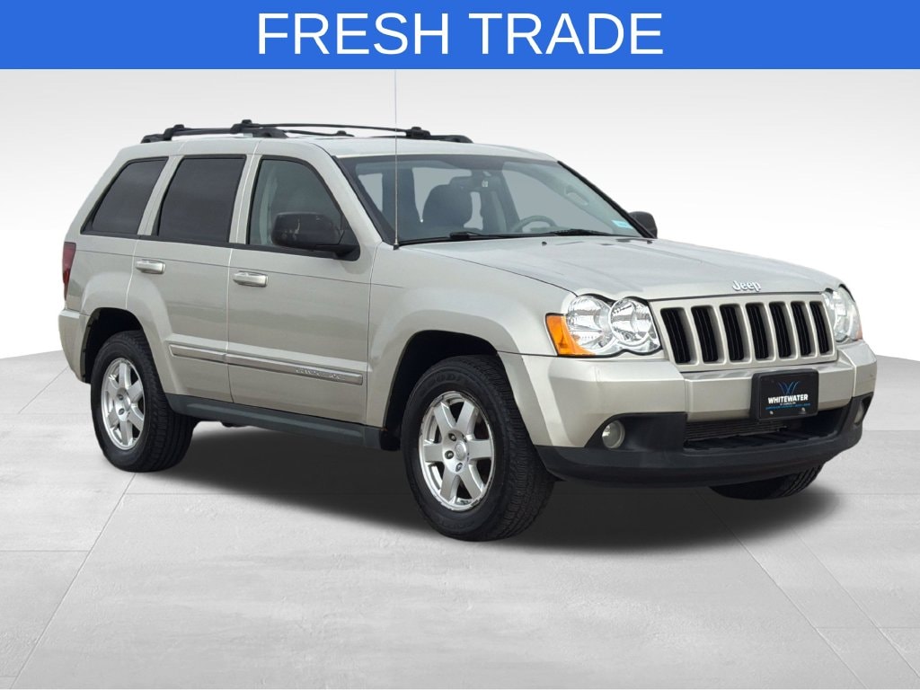 Used 2010 Jeep Grand Cherokee Laredo with VIN 1J4PR4GK6AC105963 for sale in Saint Charles, Minnesota