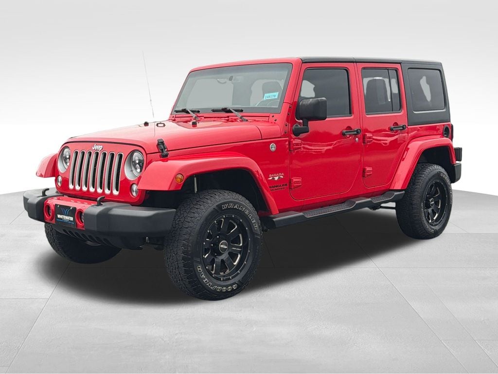 Used 2016 Jeep Wrangler Unlimited Sahara with VIN 1C4BJWEG4GL131892 for sale in Saint Charles, Minnesota
