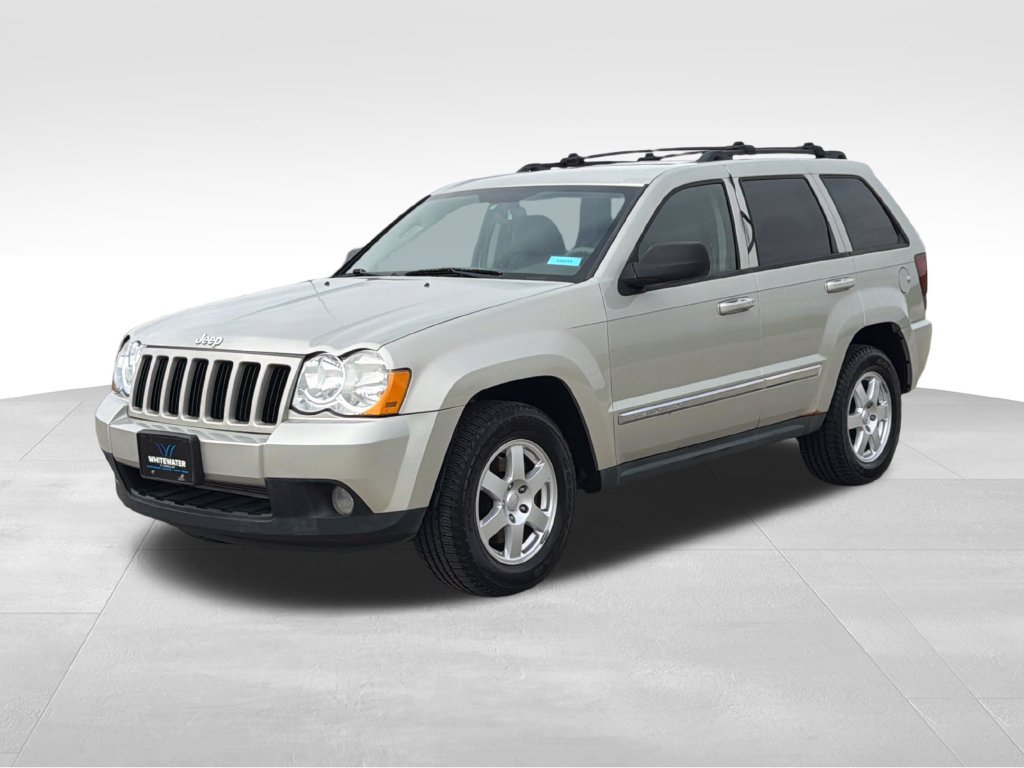 Used 2010 Jeep Grand Cherokee Laredo with VIN 1J4PR4GK6AC105963 for sale in Saint Charles, Minnesota