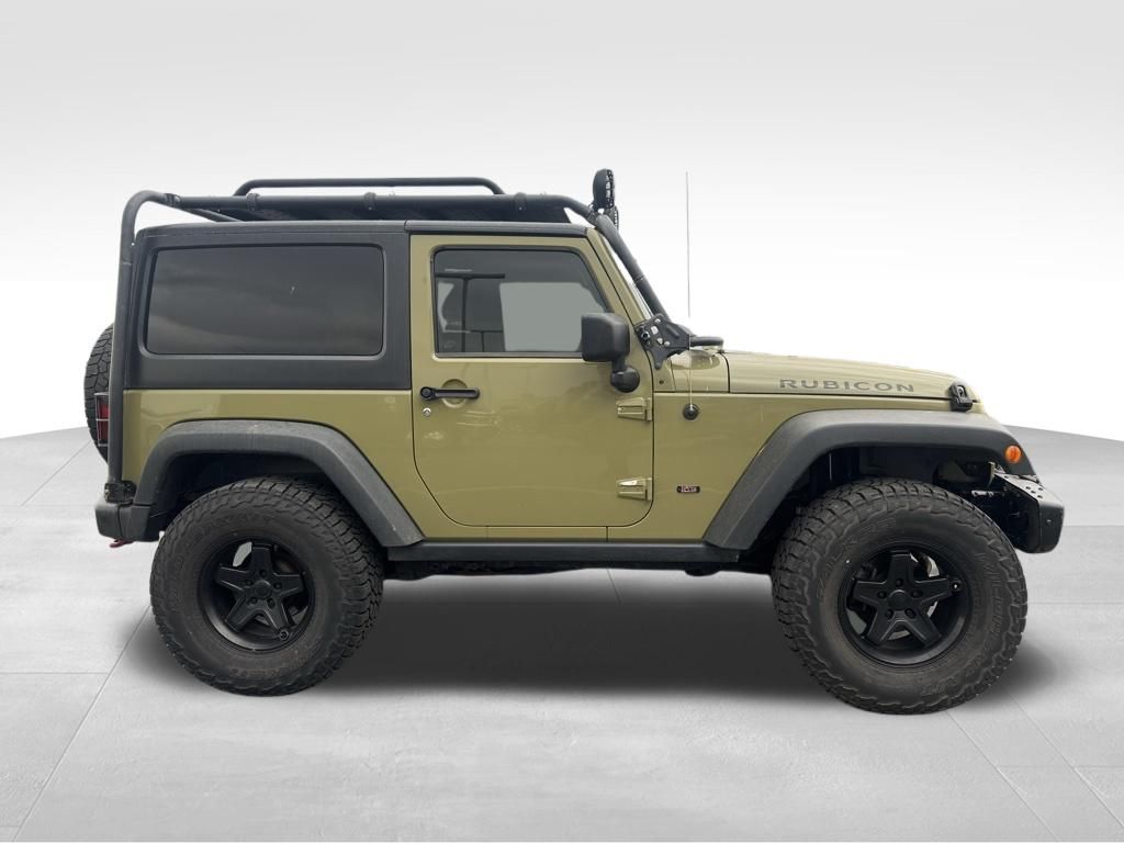 Used 2013 Jeep Wrangler Rubicon with VIN 1C4HJWCG4DL627509 for sale in Saint Charles, Minnesota