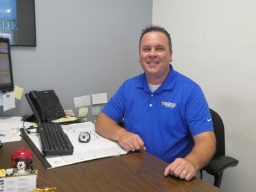 Staff member Eric Koser from a8742e93bd36
