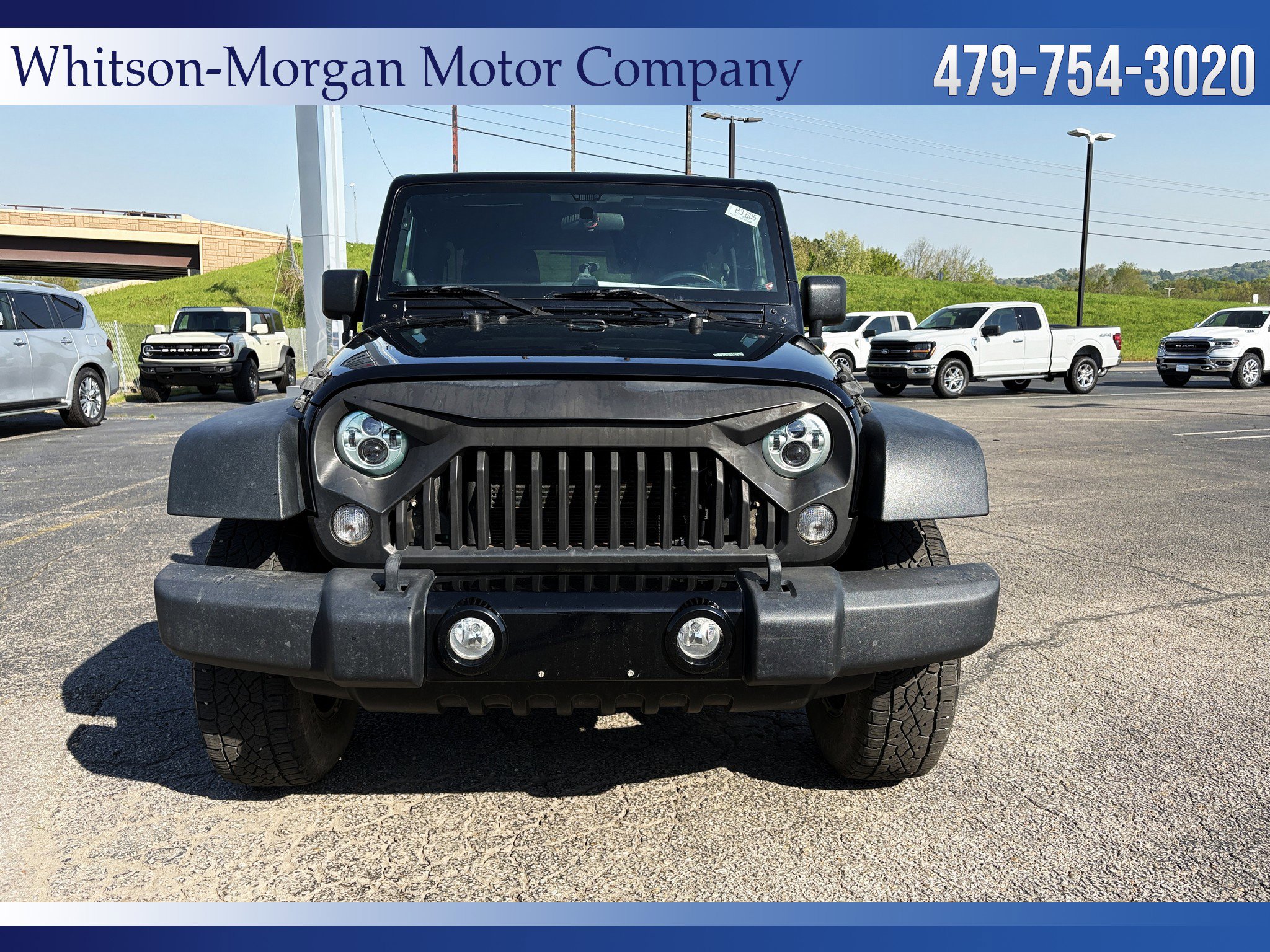 Used 2014 Jeep Wrangler Unlimited Sport with VIN 1C4BJWDG2EL259384 for sale in Clarksville, AR
