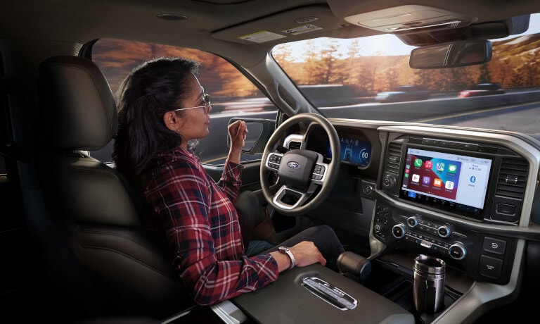 2026 Ford F-150 front with hands-off driver