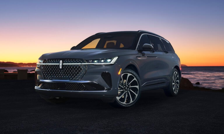 2025 Lincoln Nautilus parked by water at sunset