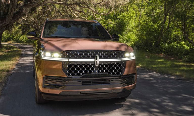 2025 Lincoln Navigator head on in forest