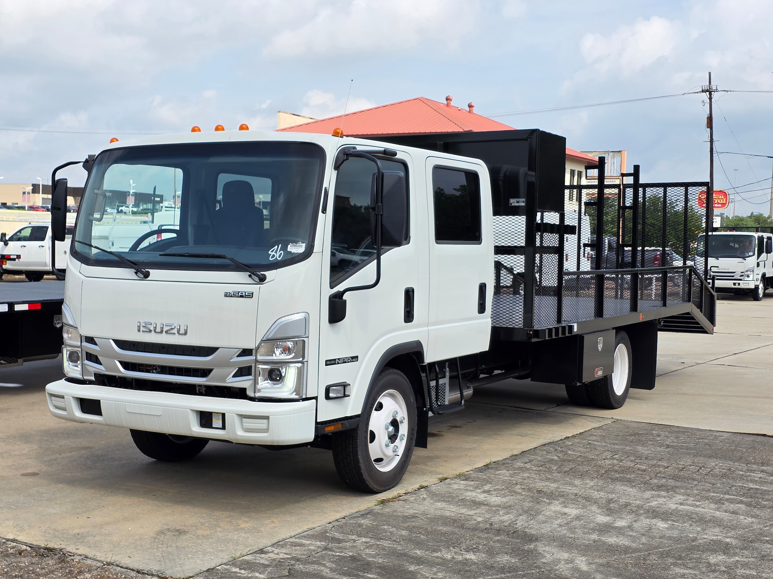 2025 Isuzu NPR-HD Truck's photo