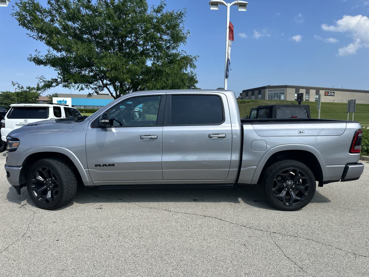 Used 2022 RAM Ram 1500 Pickup Limited with VIN 1C6SRFHTXNN413979 for sale in Waukesha, WI