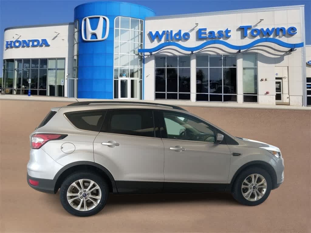 Used 2017 Ford Escape SE with VIN 1FMCU0GD5HUA89817 for sale in Madison, WI