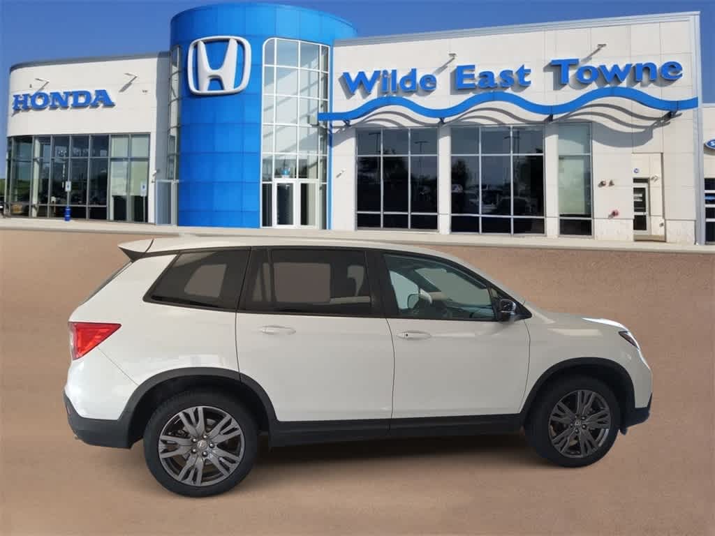 Used 2021 Honda Passport EX-L with VIN 5FNYF8H54MB009338 for sale in Madison, WI