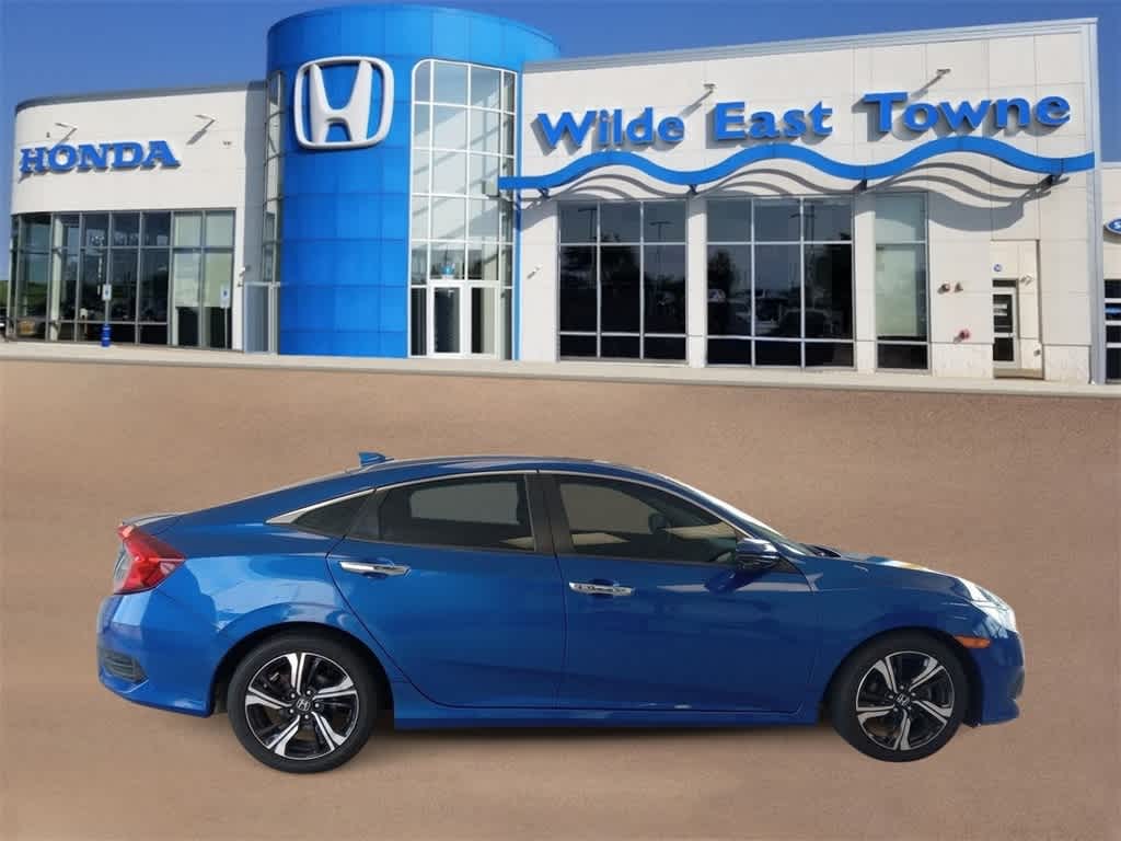 Certified 2016 Honda Civic Touring with VIN 2HGFC1F90GH648460 for sale in Madison, WI