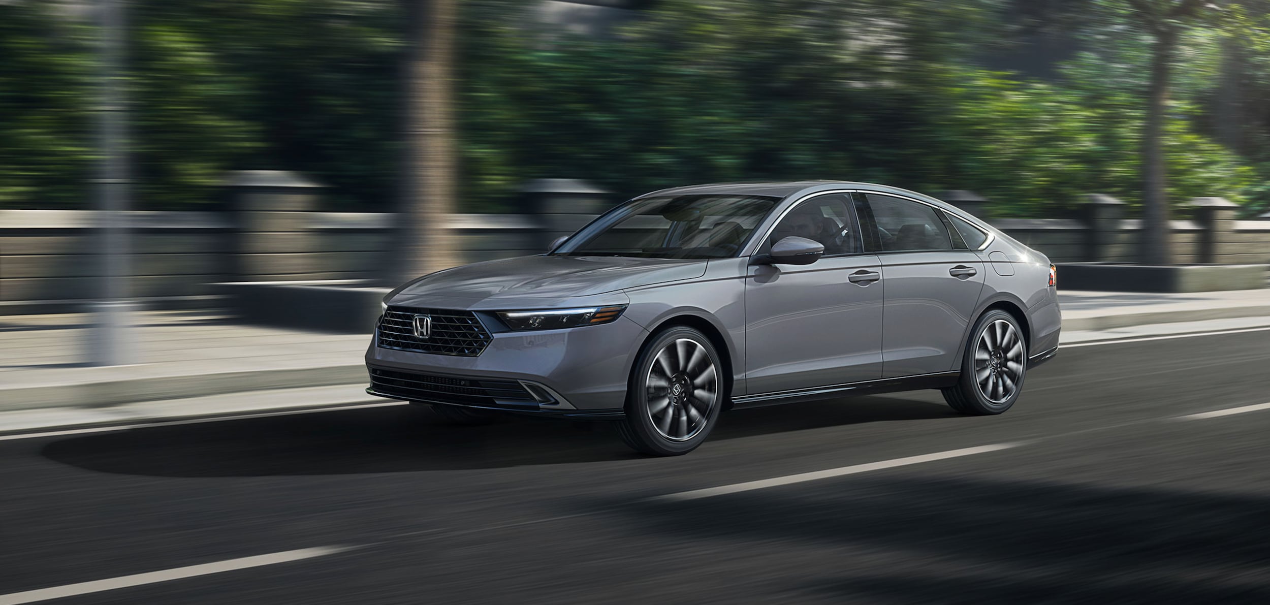 A used Honda car on the road