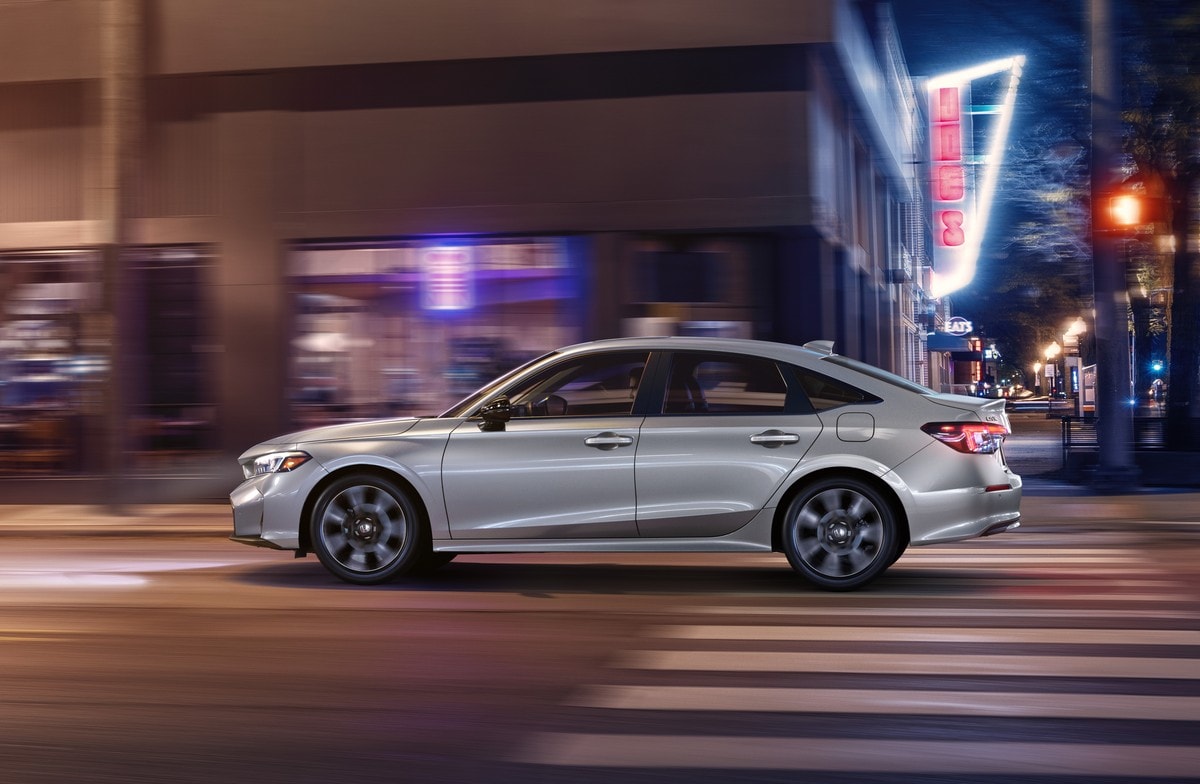 Silver 2026 Honda Civic zooming by