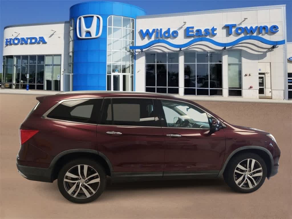 Used 2016 Honda Pilot Touring with VIN 5FNYF6H93GB005583 for sale in Madison, WI