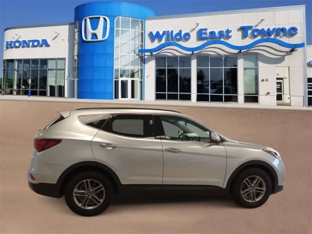 Used 2017 Hyundai Santa Fe Sport with VIN 5XYZUDLB9HG489391 for sale in Madison, WI