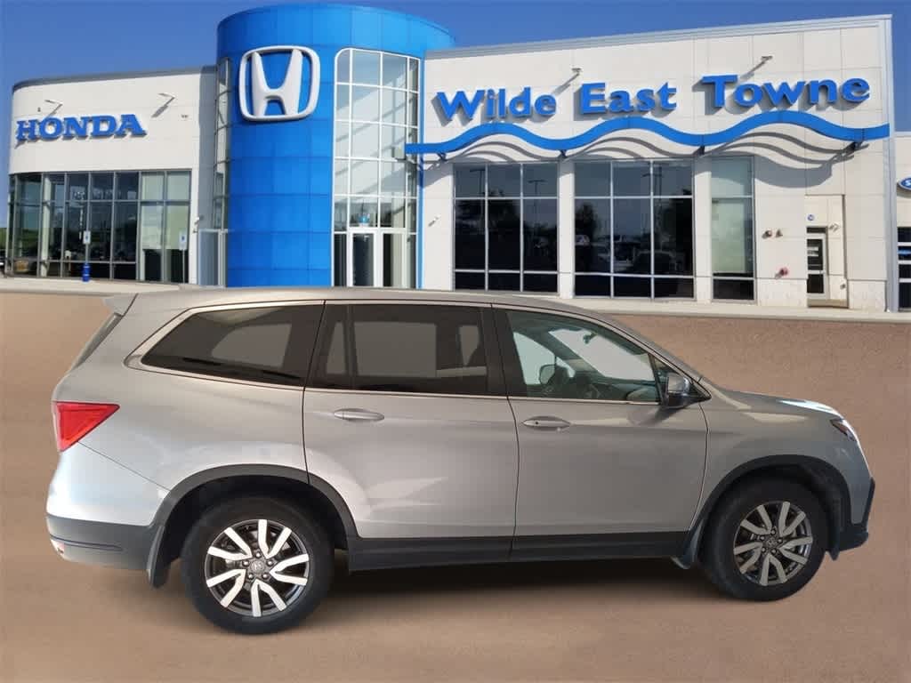 Used 2021 Honda Pilot EX-L with VIN 5FNYF6H51MB034444 for sale in Madison, WI