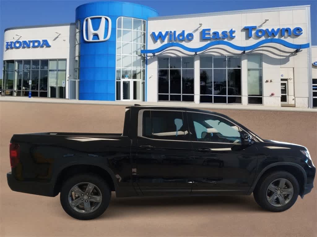 Used 2021 Honda Ridgeline RTL-E with VIN 5FPYK3F77MB015421 for sale in Madison, WI