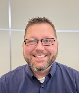 Staff member James O'Brien from ID_028e89