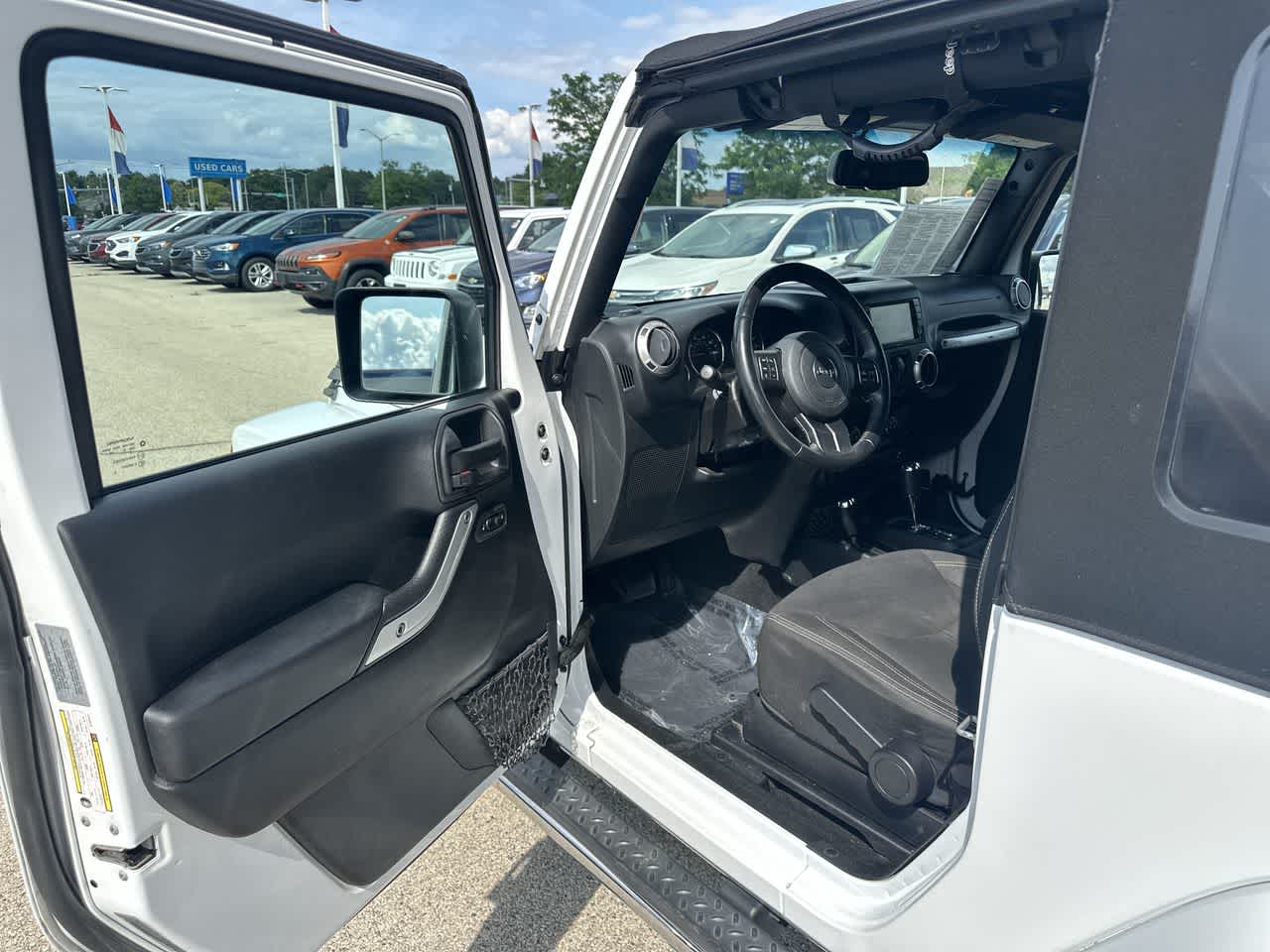 Used 2016 Jeep Wrangler Sahara with VIN 1C4GJWBGXGL345442 for sale in Waukesha, WI