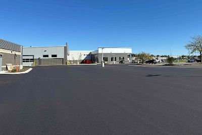 Asphalt Top Coat Installation In Progress