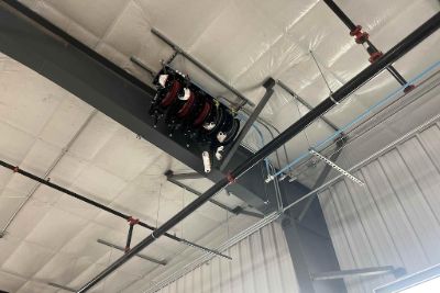Overhead Electrical And Overhead Reel Installation In Progress. Overhead Electrical And Overhead Reel Installation In Progress.