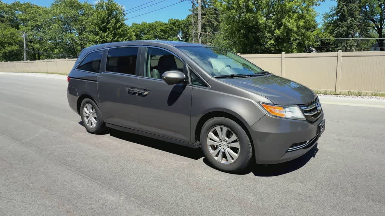 Used 2014 Honda Odyssey EX-L with VIN 5FNRL5H63EB054258 for sale in Waukesha, WI