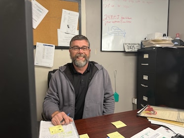 Staff member Waylon from ID_a213e8d77f38