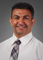 Staff member Sherif Bassyouni from ID_104708147d4e