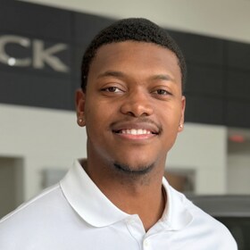 Staff member Angelo Noel from ID_a5654c842f0f