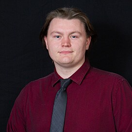 Staff member Alex King from ID_7b861d2629a7