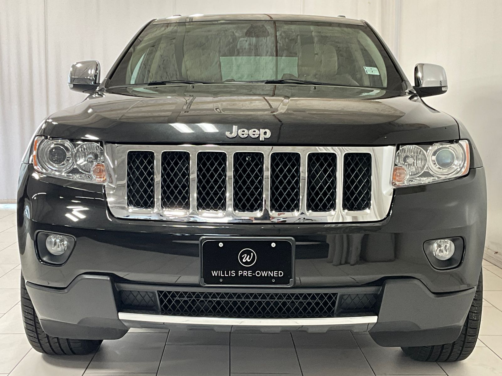 Used 2011 Jeep Grand Cherokee Overland with VIN 1J4RR6GG7BC702458 for sale in Des Moines, IA