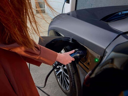 Charging cable plugged into EV