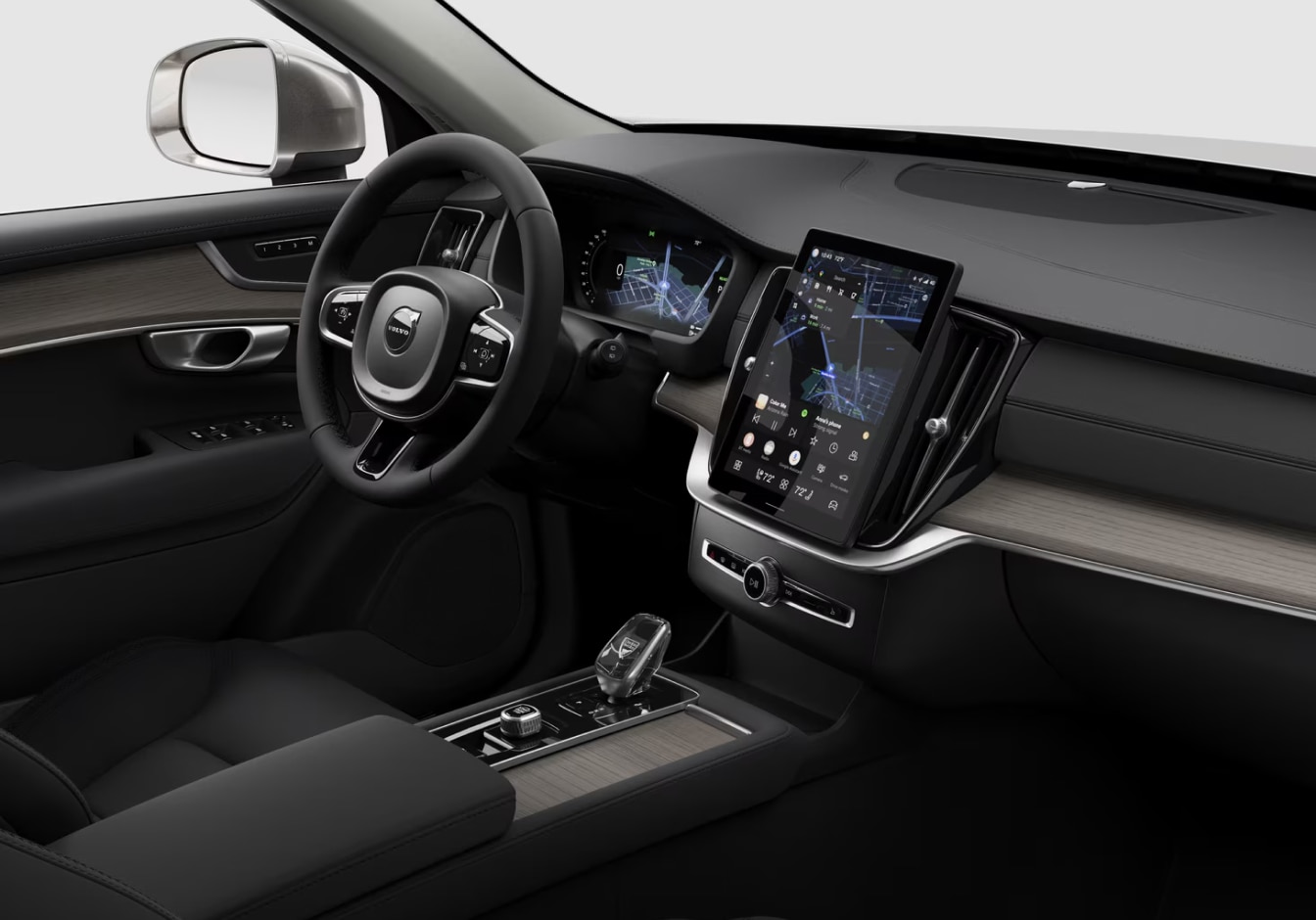 2026 Volvo XC90 interior featuring a sleek steering wheel, a digital dashboard, and a large touchscreen on the center console.