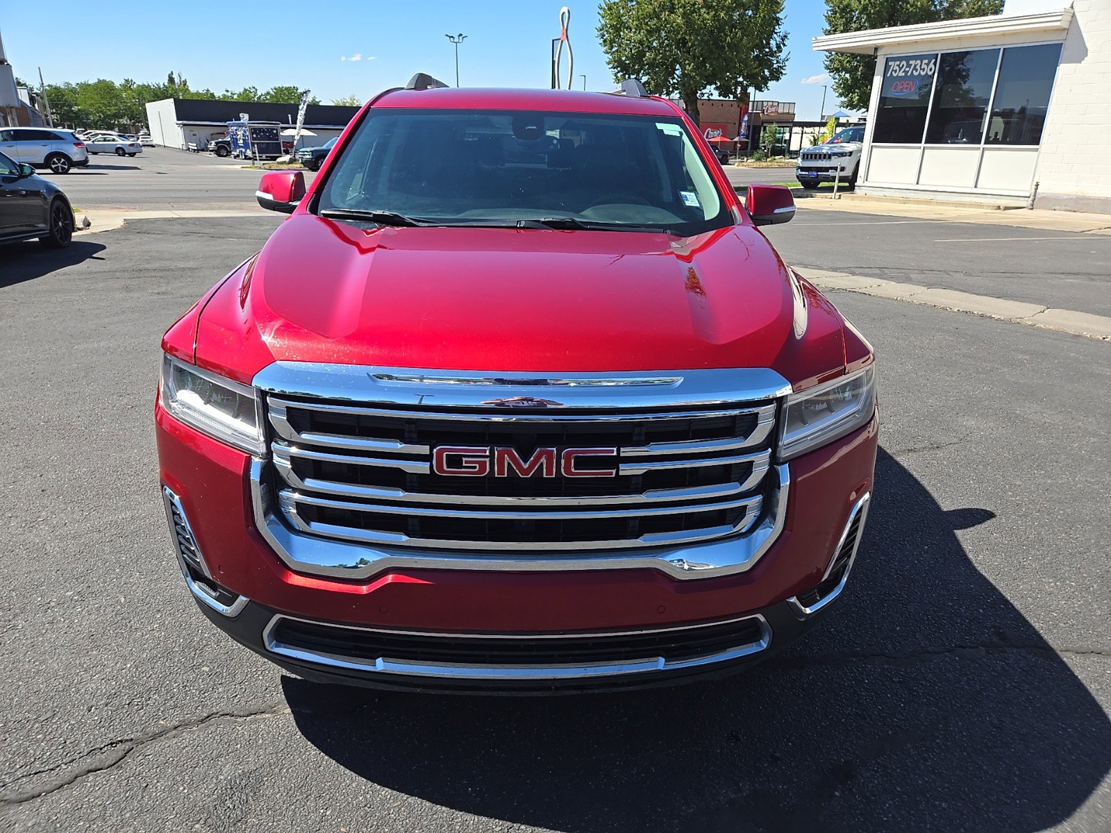 Used 2023 GMC Acadia SLT with VIN 1GKKNUL49PZ157505 for sale in Logan, UT