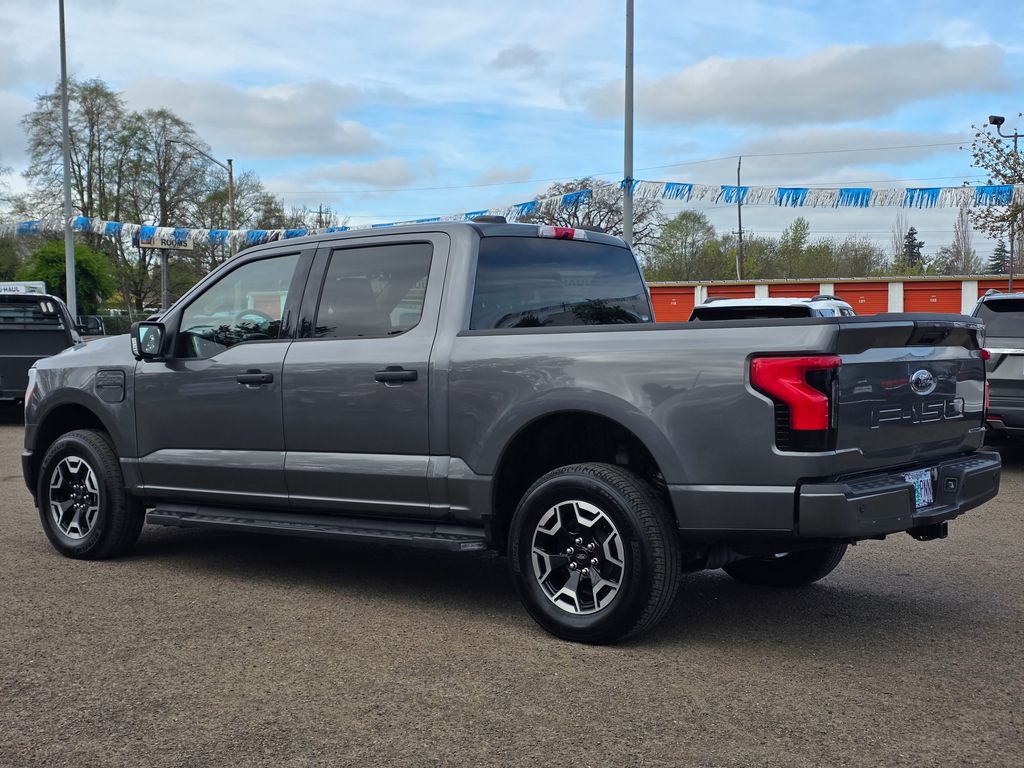 Used 2023 Ford F-150 Lightning XLT with VIN 1FTVW1EL5PWG28656 for sale in Corvallis, OR