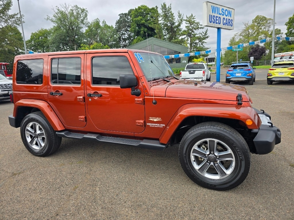 Used 2014 Jeep Wrangler Unlimited Sahara with VIN 1C4BJWEGXEL230228 for sale in Corvallis, OR