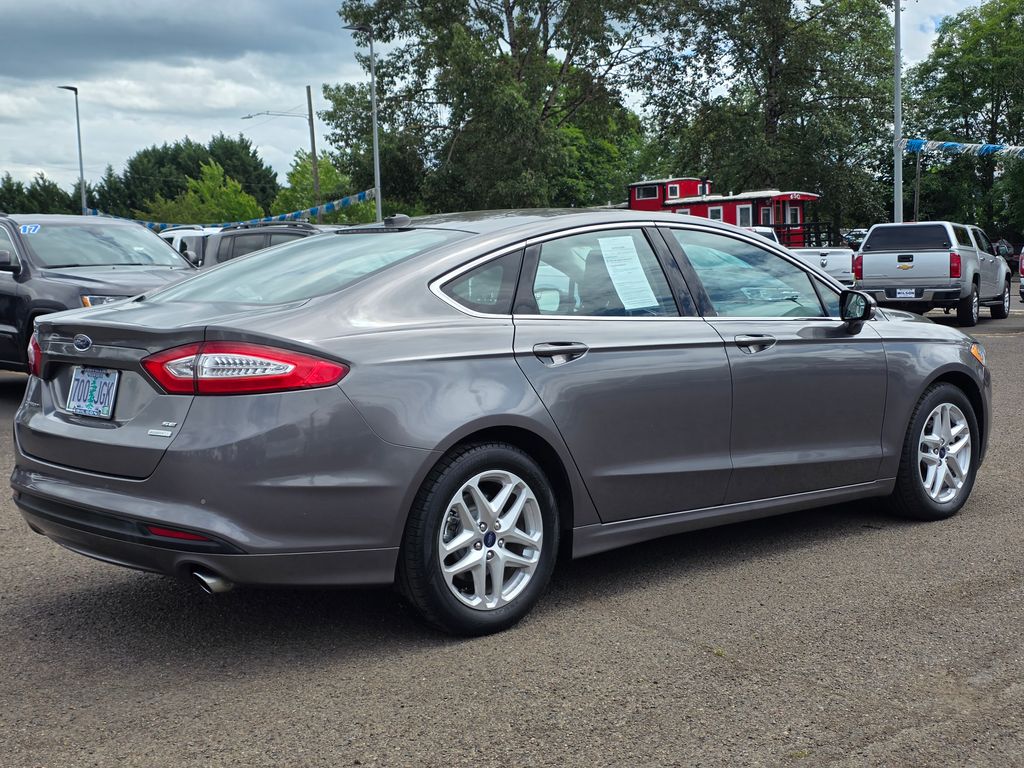 Used 2014 Ford Fusion SE with VIN 3FA6P0HD7ER151394 for sale in Corvallis, OR