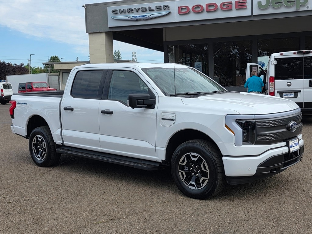Used 2023 Ford F-150 Lightning XLT with VIN 1FTVW1EL2PWG51117 for sale in Corvallis, OR