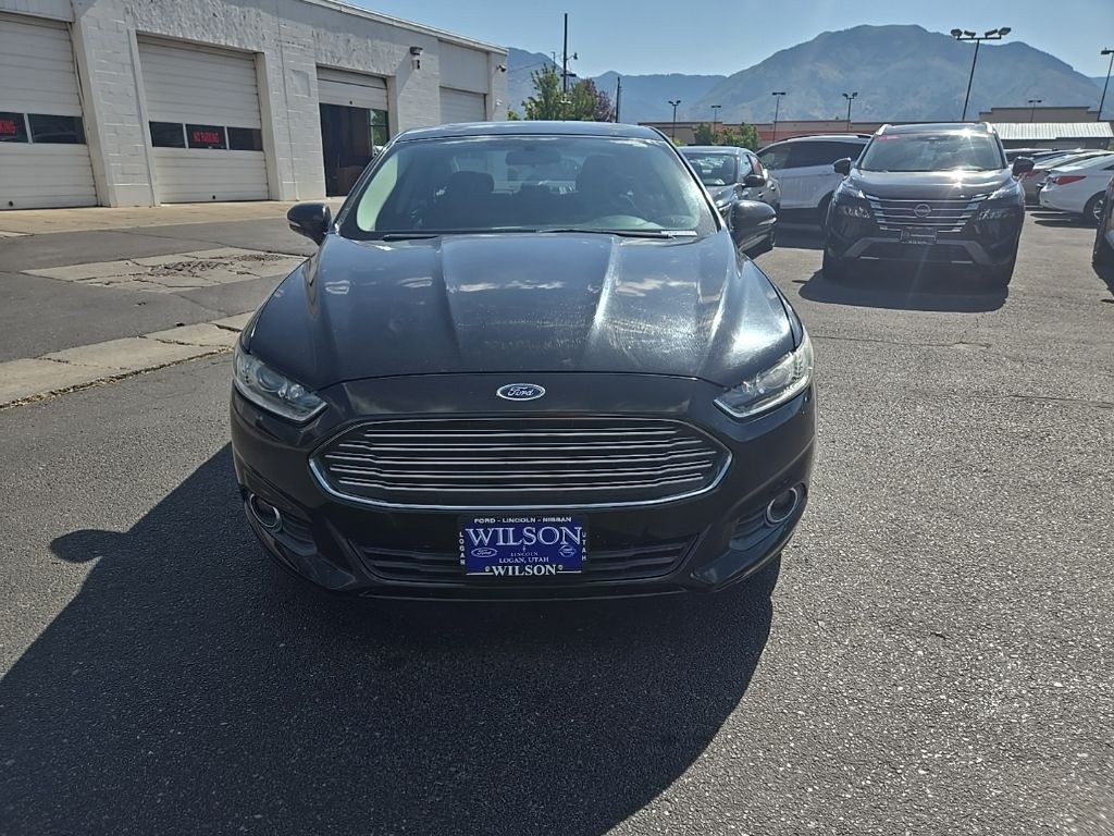 Used 2013 Ford Fusion SE Hybrid with VIN 3FA6P0LU4DR274009 for sale in Logan, UT